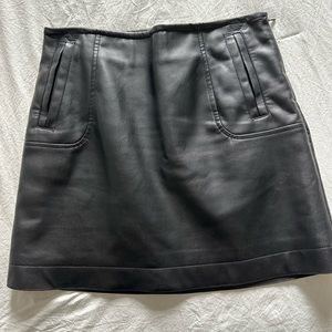 Faux leather mini skirt. Never worn